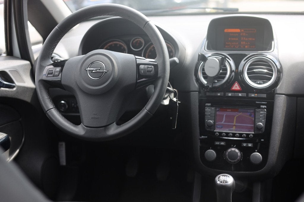 Opel Corsa 1.2-16V BLITZ | AIRCO | CRUISE | NAVIGATIE, Auto's, Voorwielaandrijving, Euro 5, Gebruikt, 4 cilinders