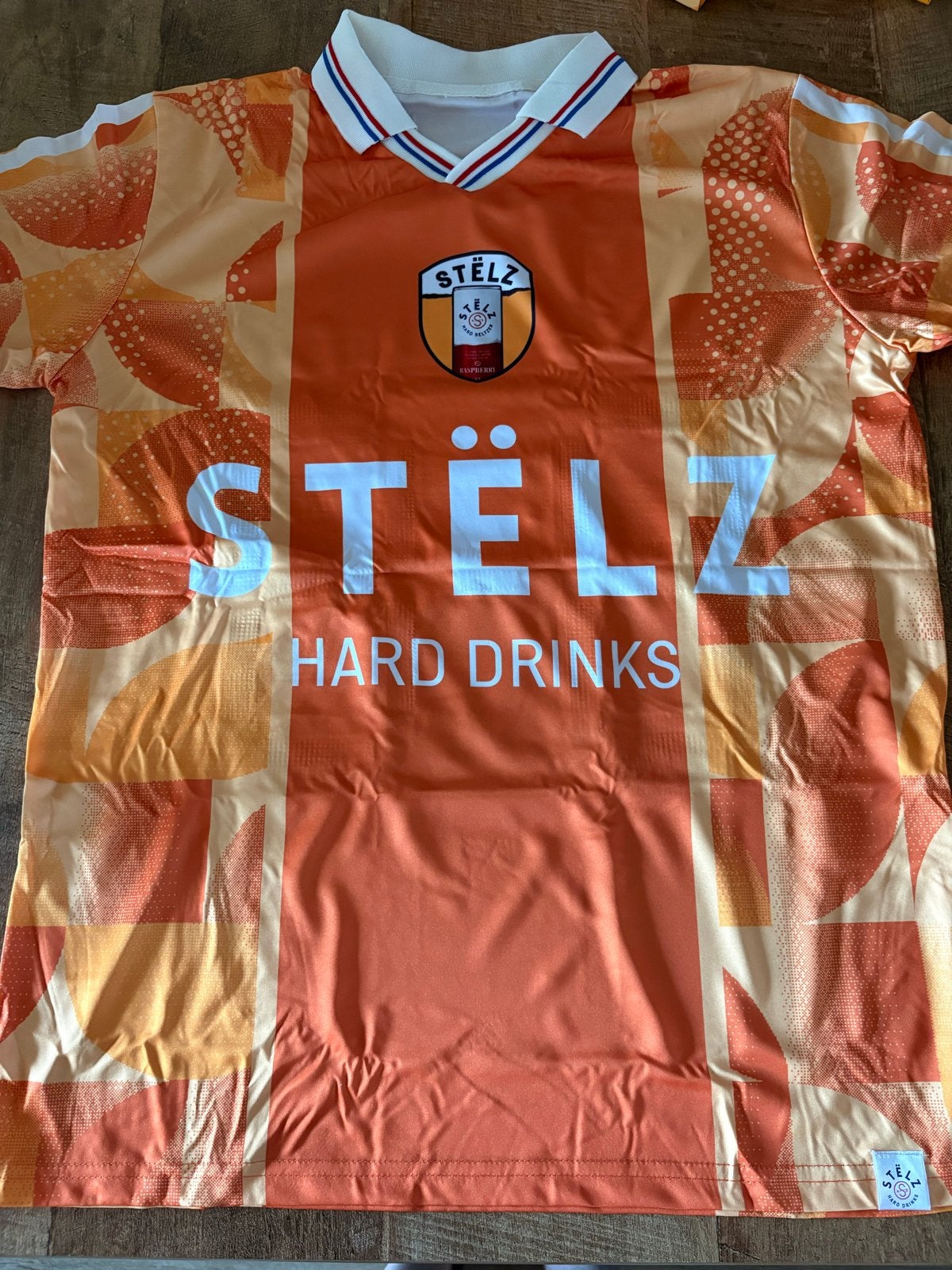 Stëlz Voorspelshirt Oranje Maat L/XL, Kleding | Heren, T-shirts, Verzenden, Nieuw, Maat 52/54 (L), Oranje
