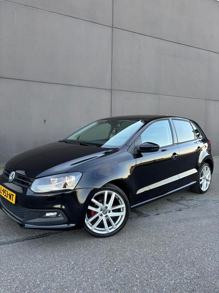 Volkswagen Polo 1.2 TSI 77KW DSG 2011 Zwart, Auto's, Volkswagen, 40 €/maand, 4 cilinders, Zwart, 1200 kg