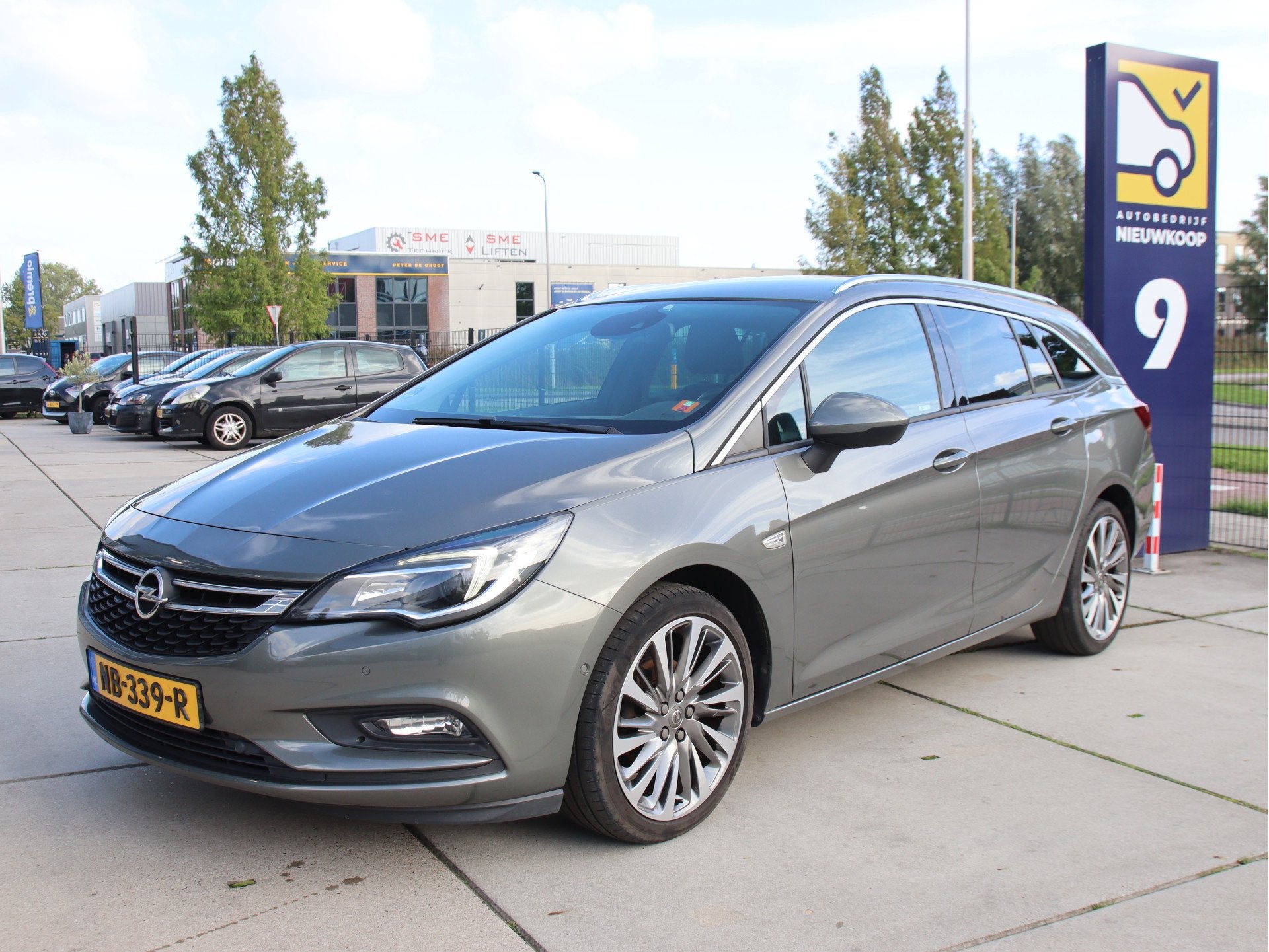 Opel Astra Sports Tourer 1.4 Innovation Automaat, Trekhaak,, Gebruikt, 150 pk, Leder en Stof, Origineel Nederlands