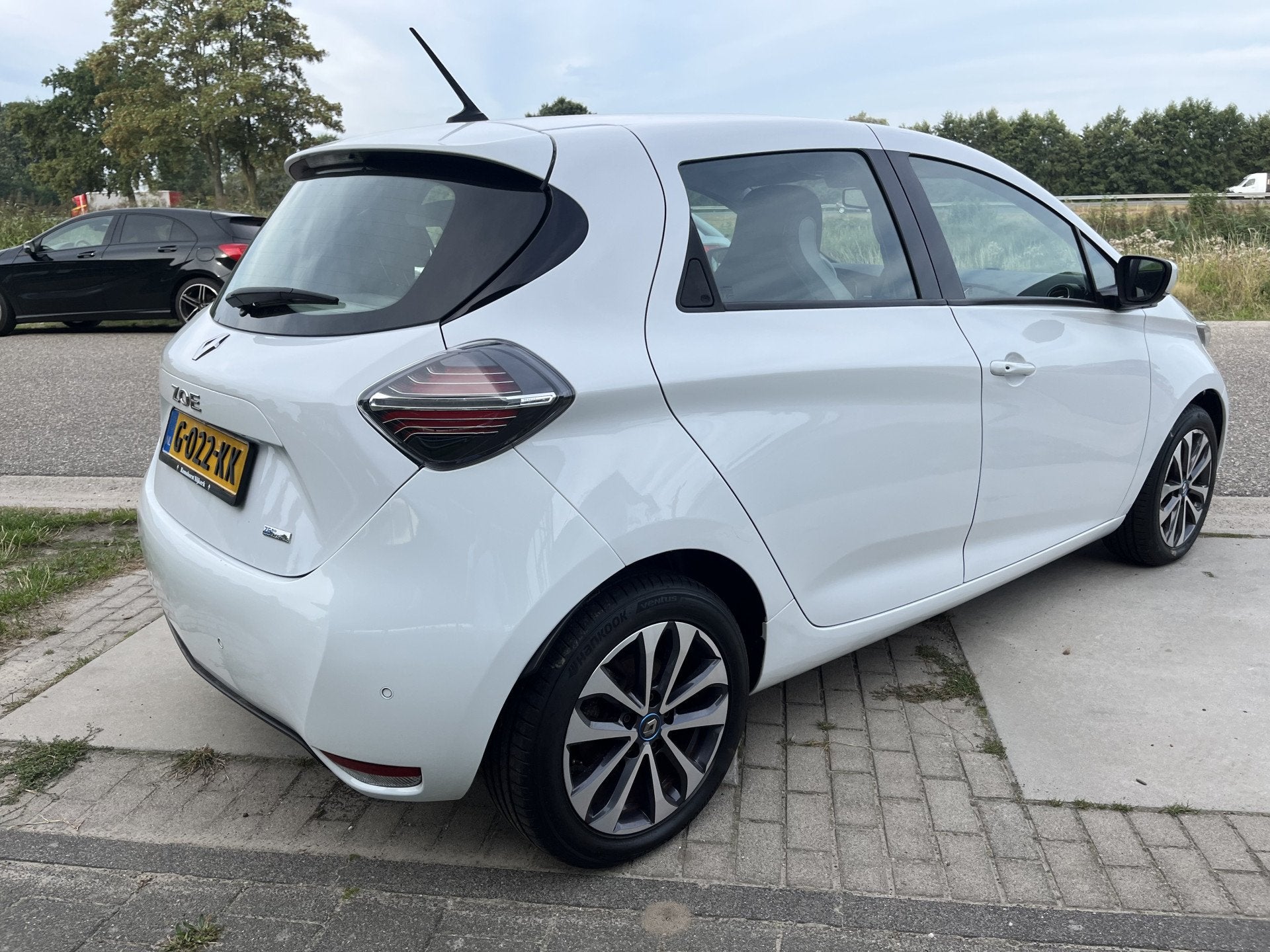 Renault ZOE R135 52 kWh / Koopaccu / Keyless / Snellader CCS, Auto's, Renault, 12 maanden, Gebruikt, Zwart, Wit