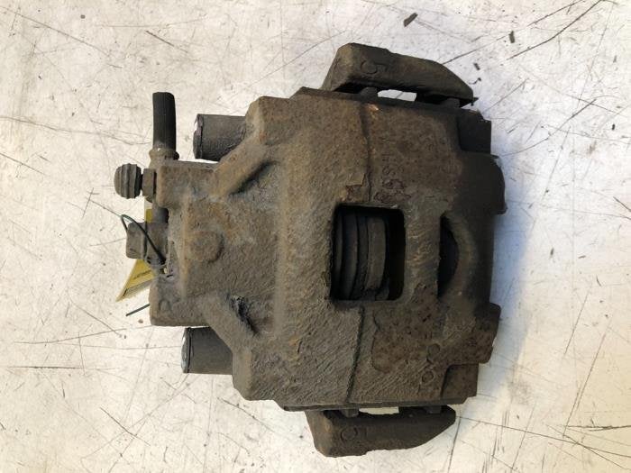 Remklauw (Tang) links-voor van een Toyota Yaris, Gebruikt, -, -, Ophalen of Verzenden