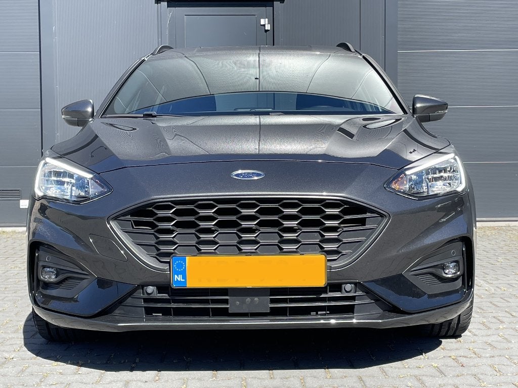 FORD FOCUS WAGON ST-LINE BUSINESS 125PK ECOBOOST AUTOMAAT, Auto's, Ford, Stationwagon, Grijs, Particulier, Sportstoelen