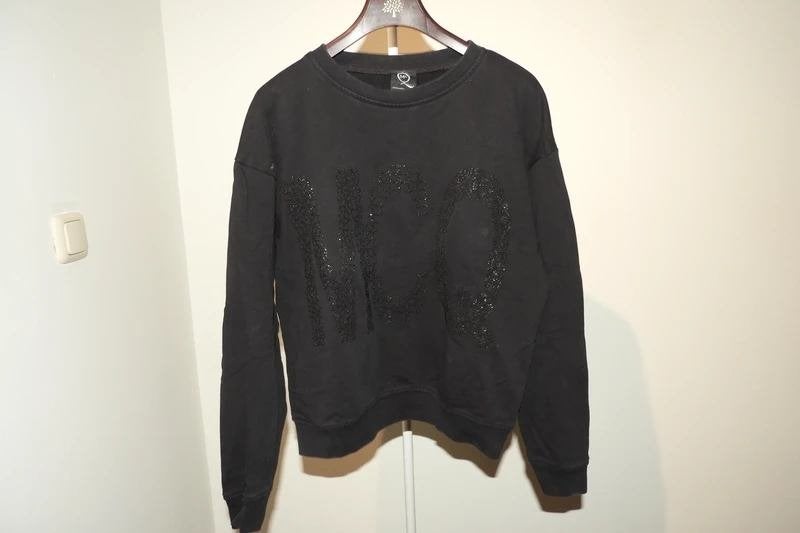 Alexander McQueen zwarte sweater merk druk apart voor xs/s