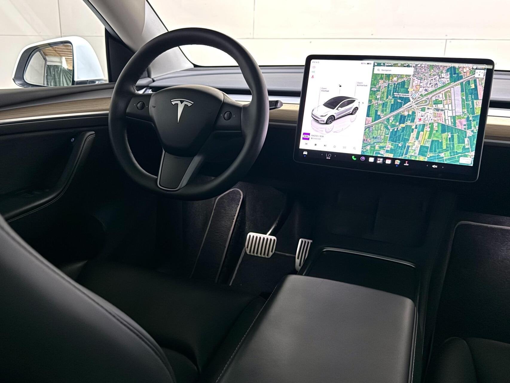 Foto 17 van Tesla Model Y RWD 58 kWh 92% SOH Black Edition Trekhaak FSD