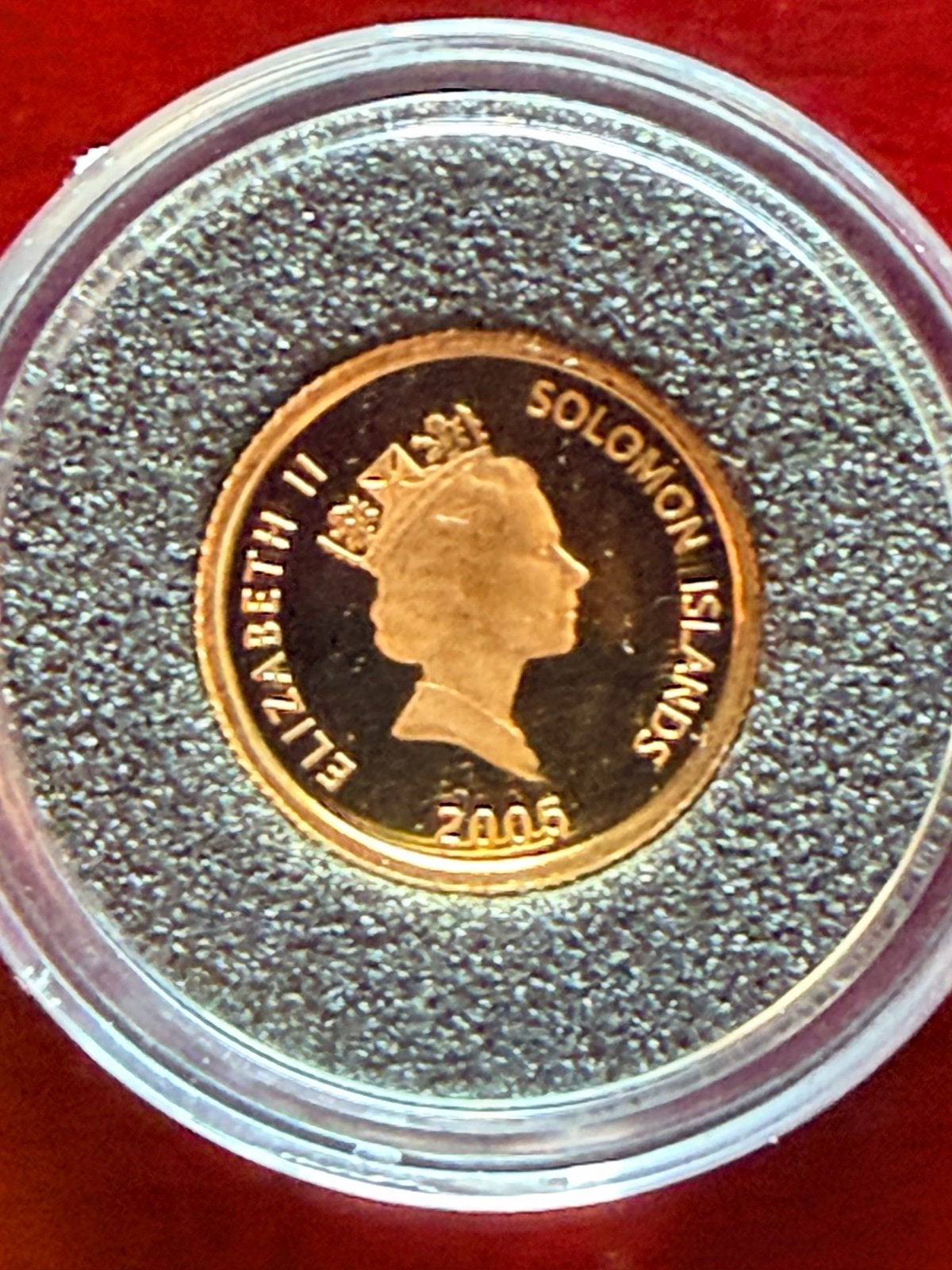 Zeldzame gouden John Lennon munt 2005  .999 goud, Postzegels en Munten, Ophalen of Verzenden, Zuidoost-Azië, Losse munt, Goud