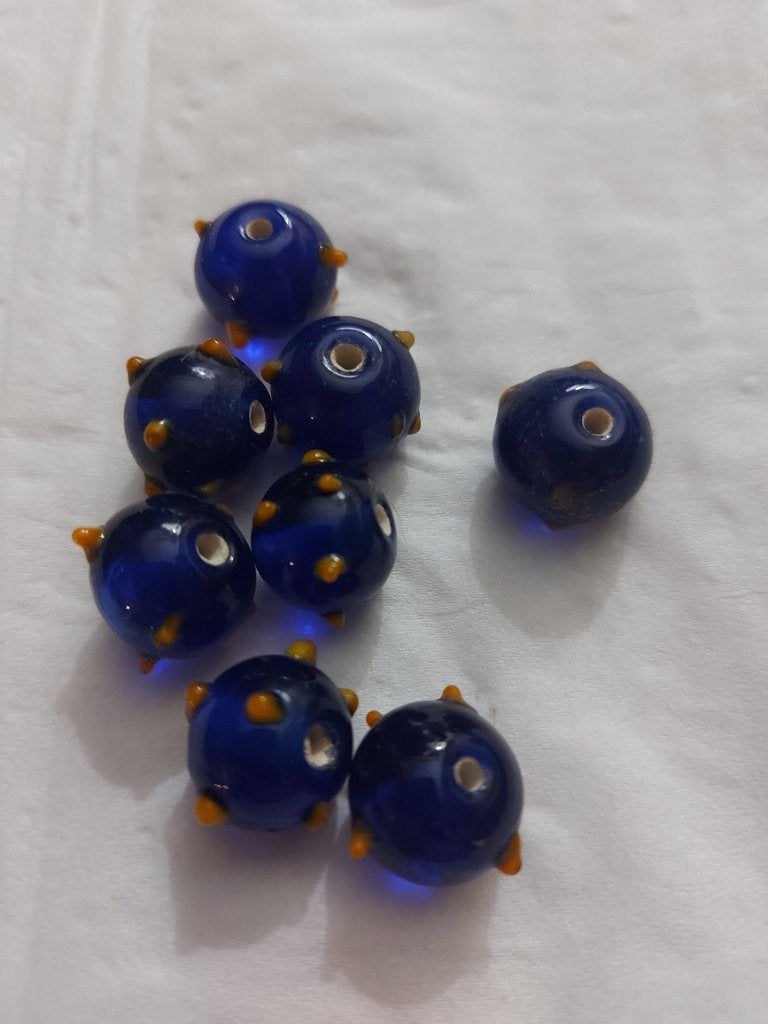 Donkerblauw met oranje pukkel lampwork glaskralen, Verzenden, Nieuw, Kraal