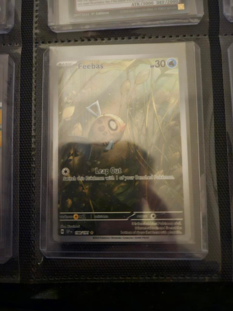 Pokemon Feebas 198/191 Surging Sparks, Hobby en Vrije tijd, Verzamelkaartspellen | Pokémon, Ophalen of Verzenden, Zo goed als nieuw