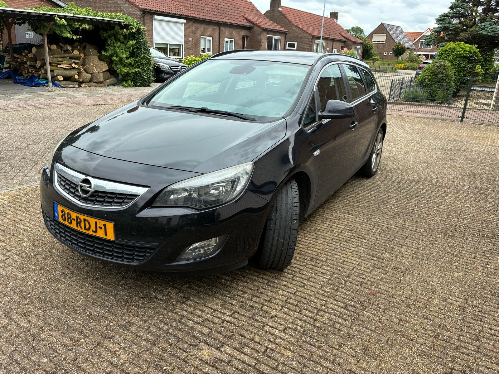 Opel Astra 1.4 Turbo 103KW ST 2011 Zwart, Voorwielaandrijving, Stof, Zwart, 4 cilinders