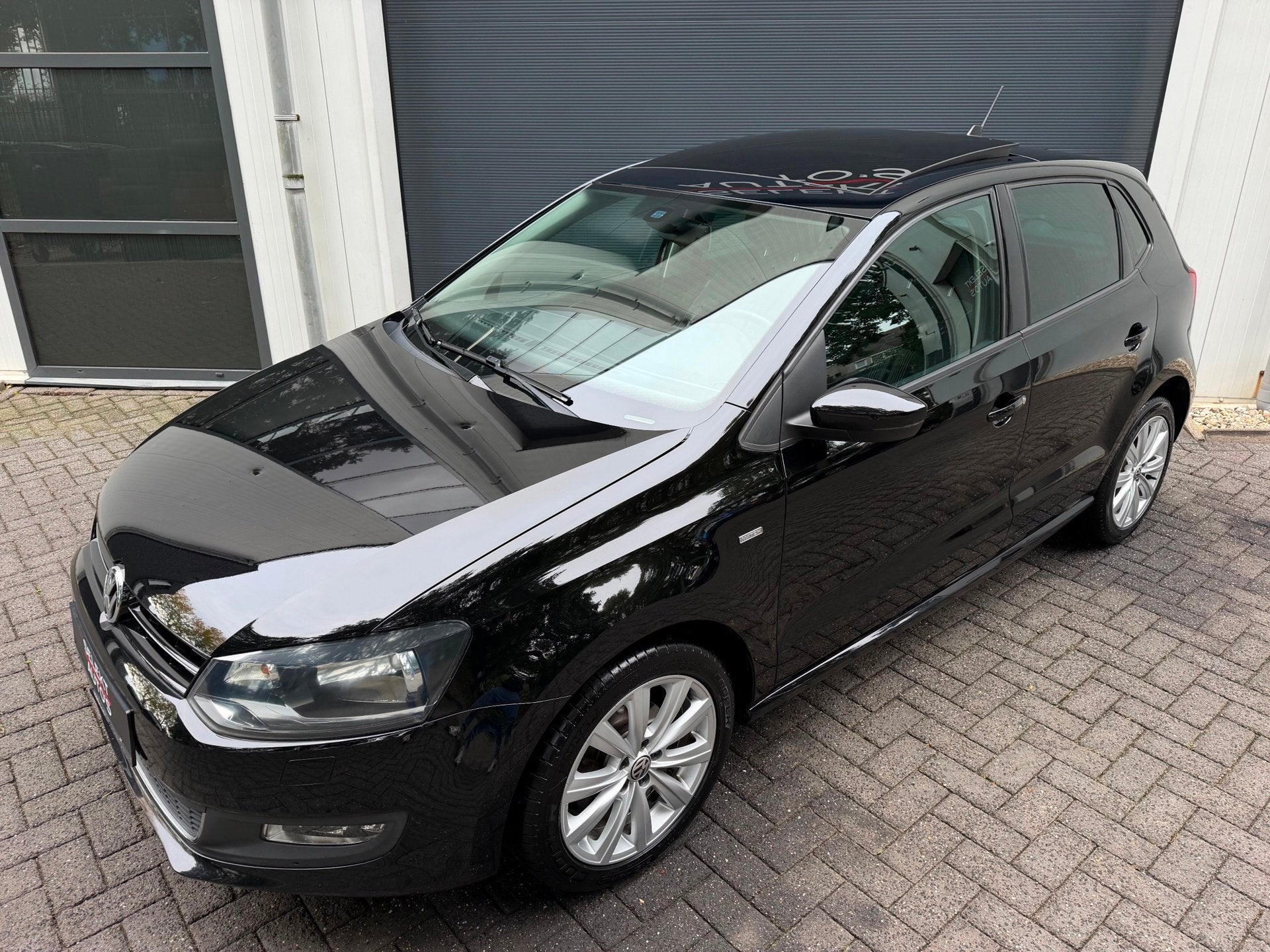 Volkswagen Polo 1.2 TSI Match 105 Pk Pano/Airco/Cruise/PDC/A, Voorwielaandrijving, Gebruikt, Zwart, Leder en Stof