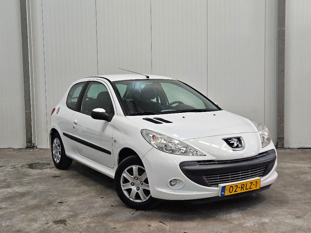 Peugeot 206+ 1.4XS | 2011 | 120.781km NAP | AIRCO | TREKHAAK, Auto's, Voorwielaandrijving, Stof, Zwart, 4 cilinders
