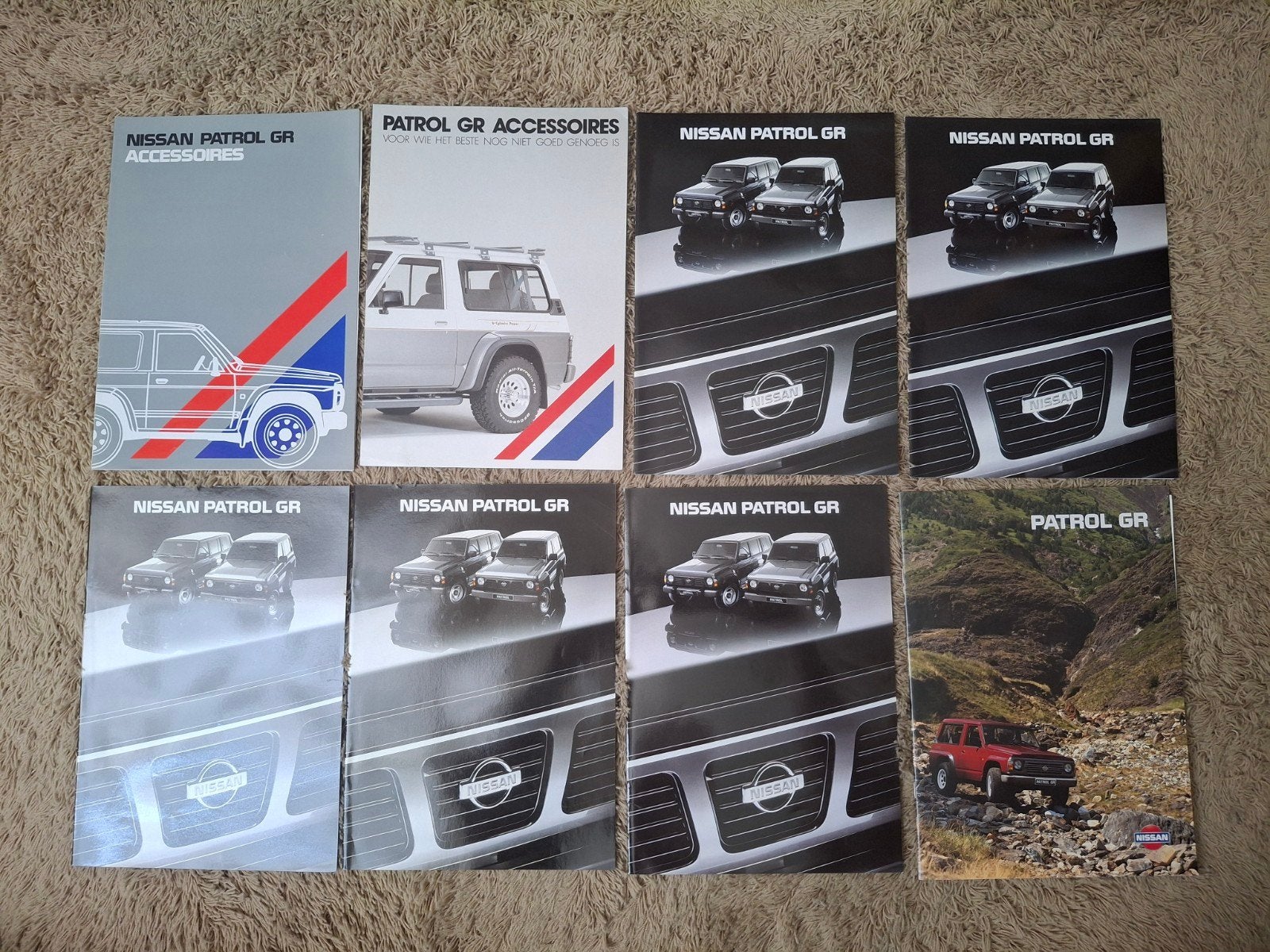 Lot autofolders Nissan Patrol GR, Verzenden, Zo goed als nieuw, Nissan