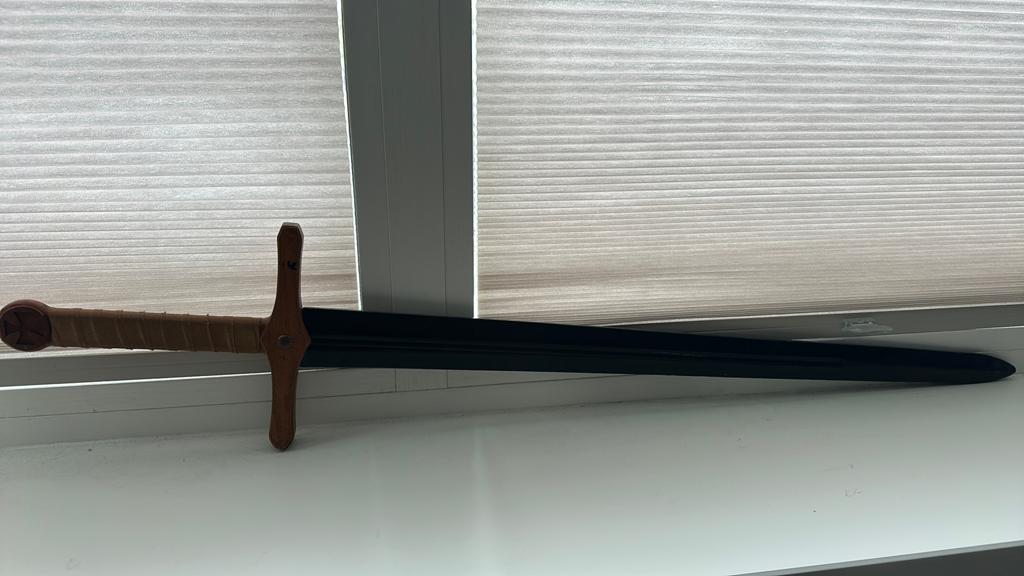 Houten zwaard, Ophalen