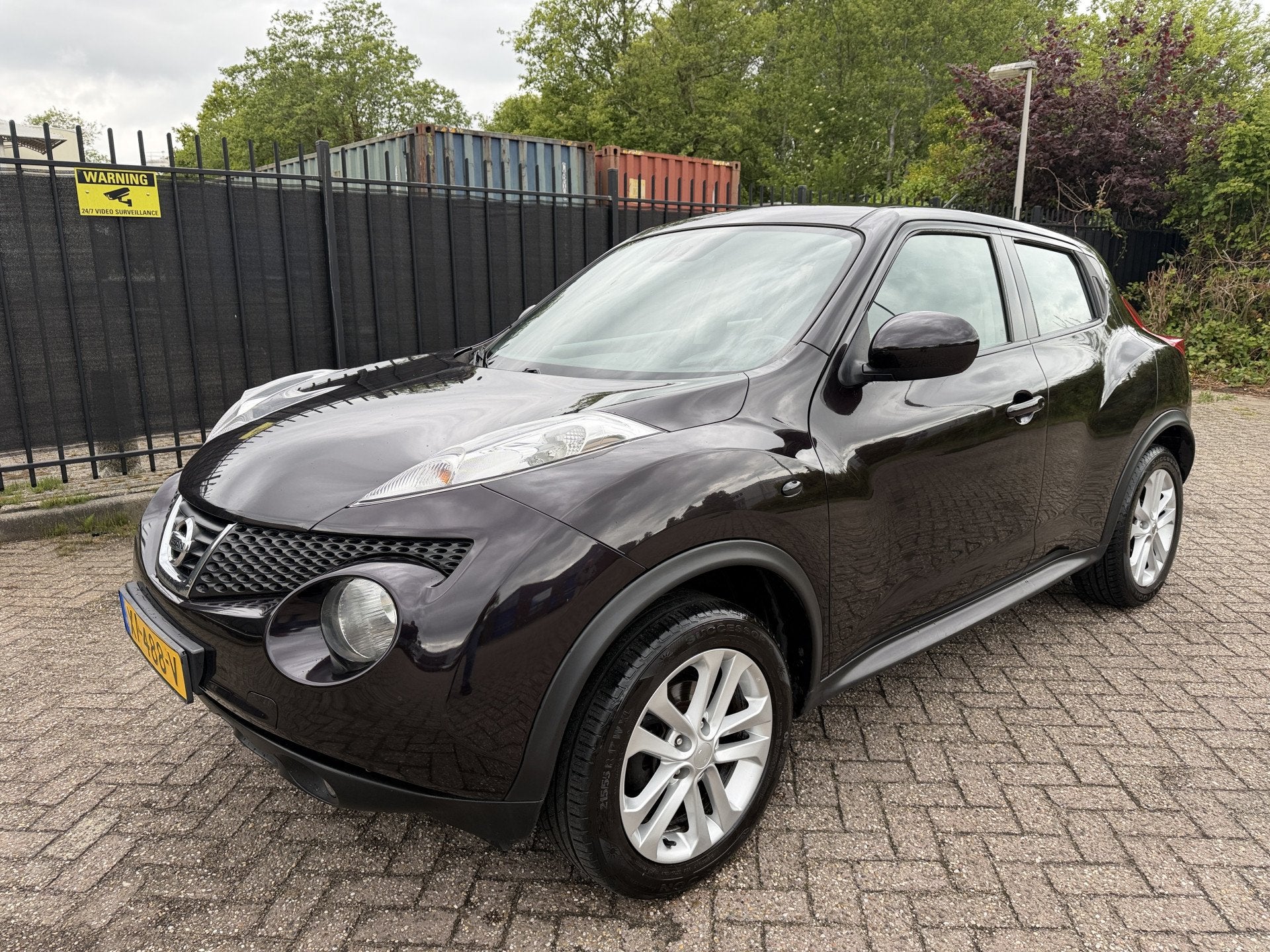 Nissan Juke 1.6 Tekna Clima/Navi/Camera/Trekhaak (bj 2013), Auto's, Euro 5, Stof, Zwart, 4 cilinders