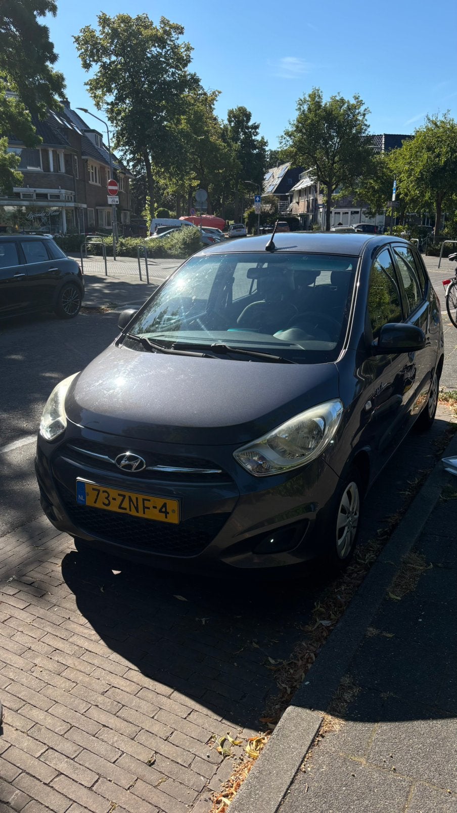 Hyundai i10 1.0 5DR 2012 Grijs, Auto's, Voorwielaandrijving, Euro 5, Stof, USB