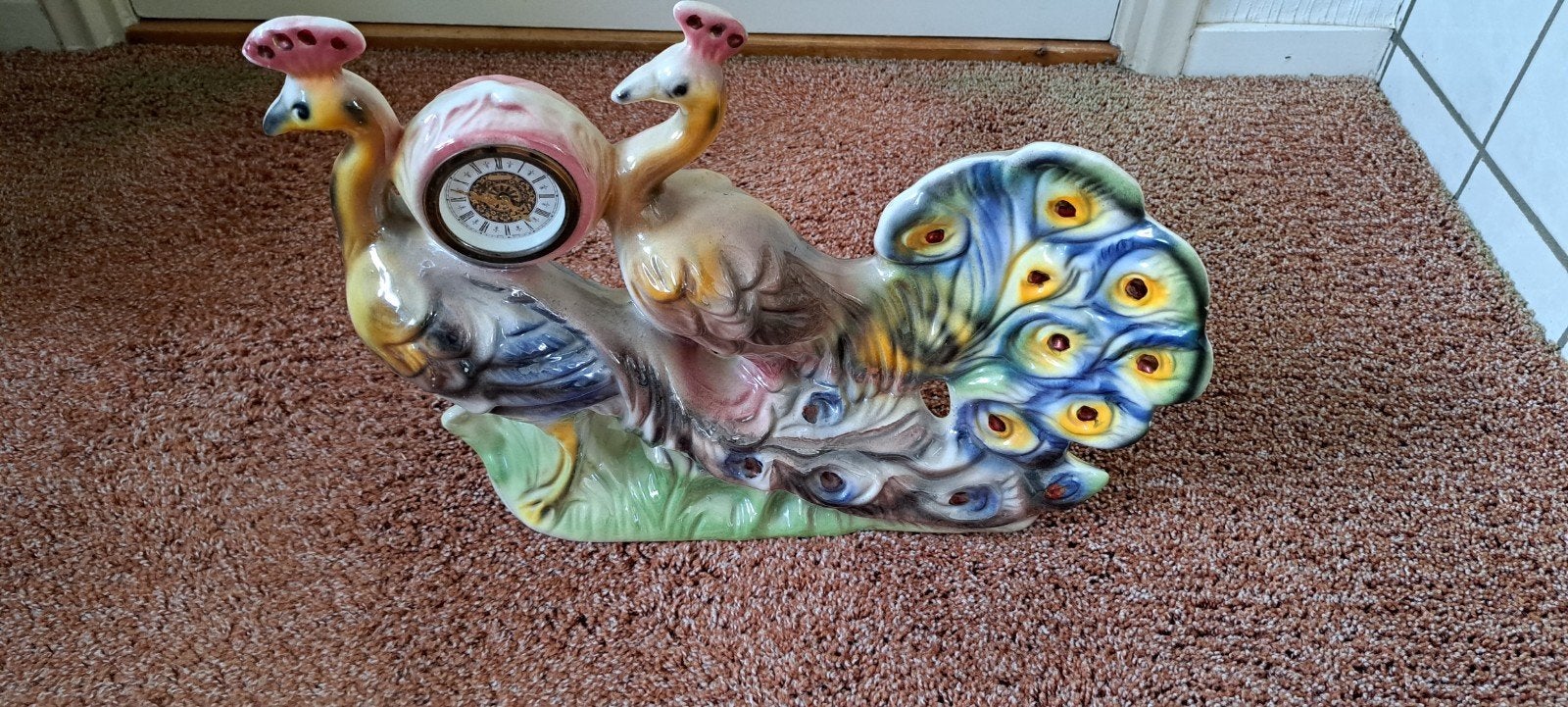 Klok met pauw, Antiek en Kunst, Ophalen