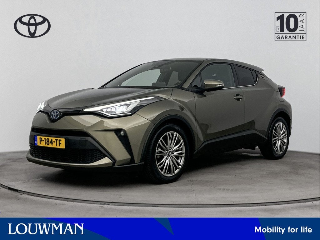 Toyota C-HR 1.8 Hybrid Executive | Dealer Onderhouden | JBL, Auto's, Toyota, 12 maanden, 4 cilinders, Leder en Stof, 122 pk
