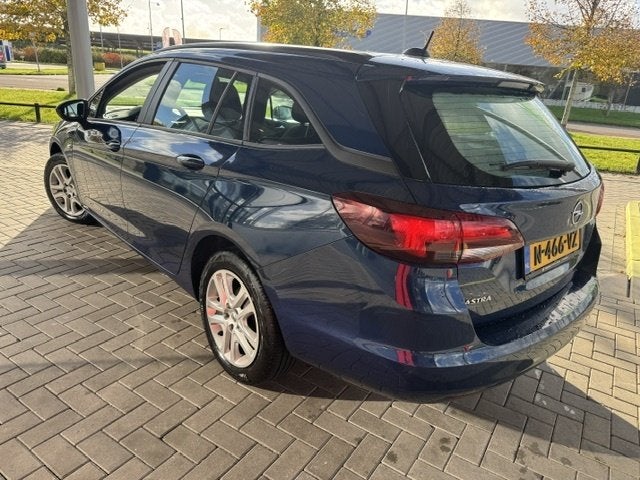 Opel Astra Sports Tourer 1.2 Bns Edition, Auto's, Stof, Gebruikt, Euro 6, 1199 cc