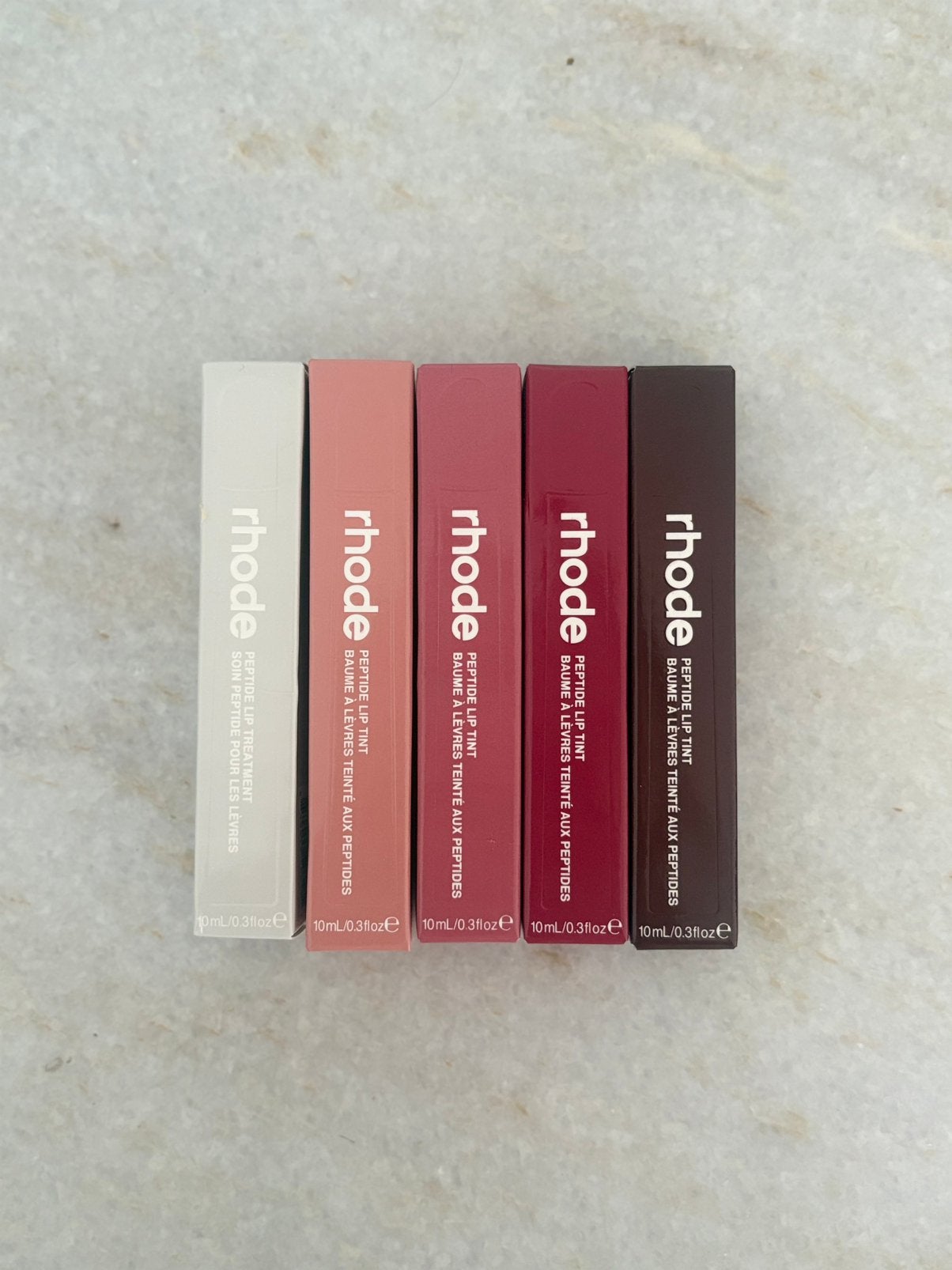 Rhode peptide lipgloss, Sieraden, Tassen en Uiterlijk, Uiterlijk | Cosmetica en Make-up, Lippen, Nieuw, Ophalen of Verzenden, Make-up