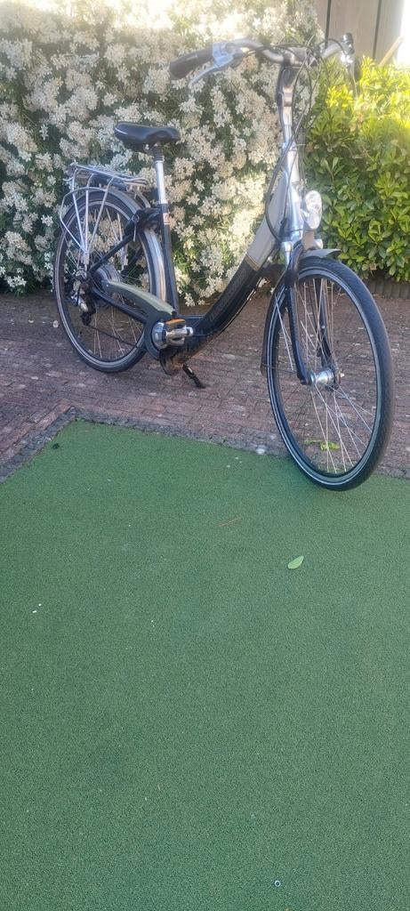 Een elektrische fiets BATAVUS opknapper, 55 tot 59 cm, Ophalen of Verzenden, Gebruikt, Batavus