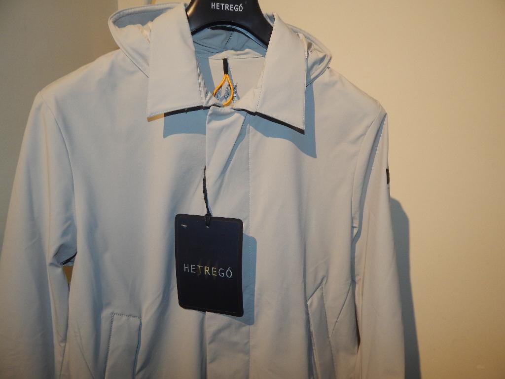 Hetrego licht grijze jas Nieuw capuchon en rits mt 50, Hetrego, Nieuw, Grijs, Verzenden