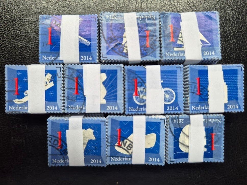 10 bundels van 100 Nederlandse iconen, Verzenden, Na 1940, Gestempeld