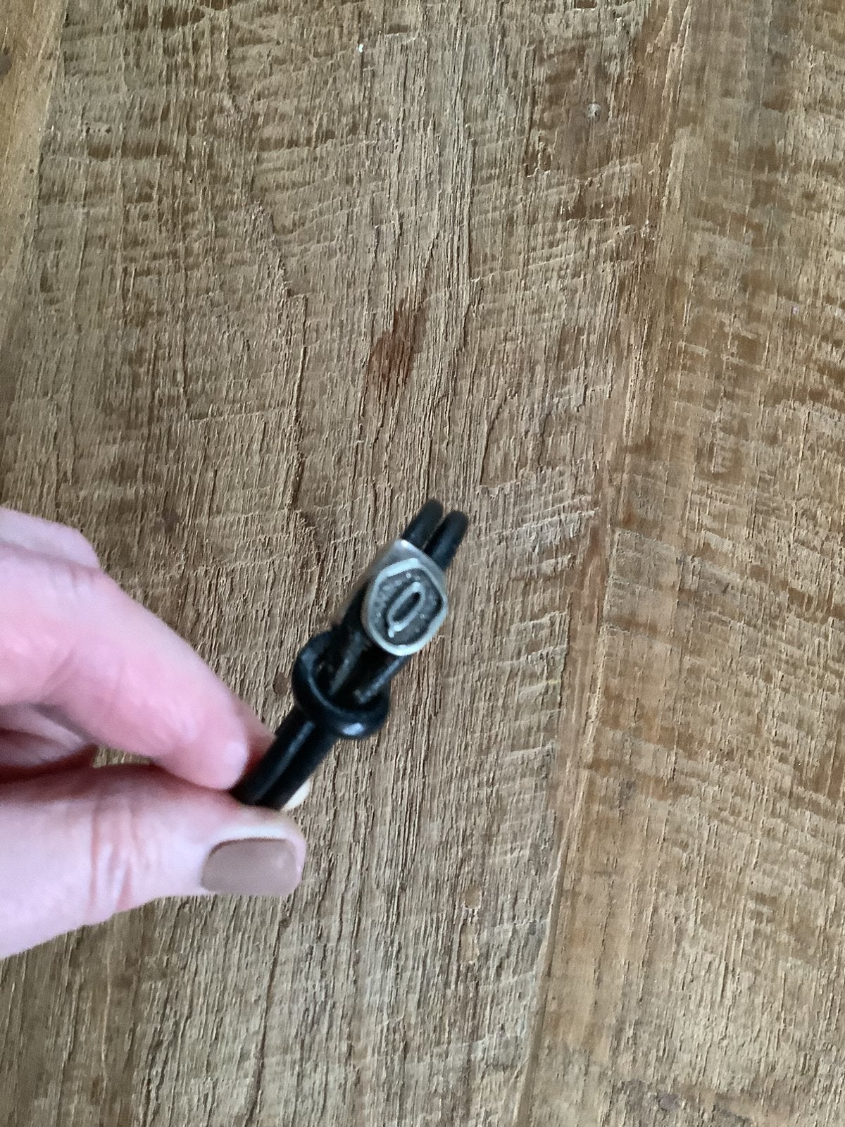 Stoere armband(Qoss), Ophalen of Verzenden, Zo goed als nieuw, Bruin, Leer
