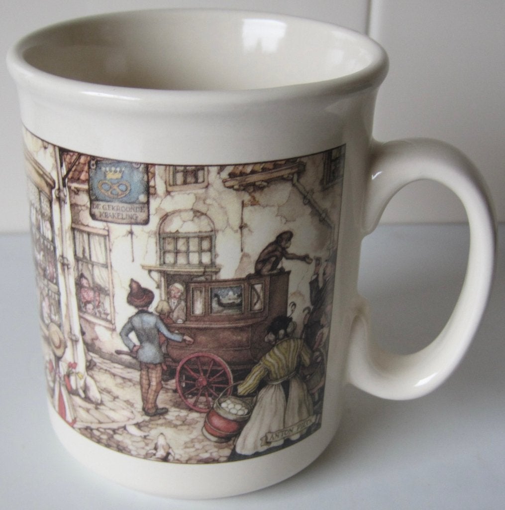 beker met afbeelding van Anton Pieck - de orgeldraaier, Ophalen of Verzenden, Zo goed als nieuw, Overige stijlen, Kop(pen) en/of Schotel(s)