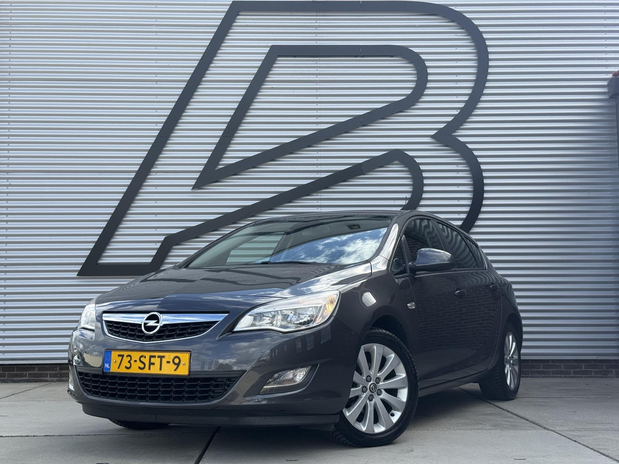Opel Astra 1.4 Turbo Edition 2e Eigenaar|Trekhaak|Airco|Crui, Auto's, Euro 5, Gebruikt, 4 cilinders, 1353 kg