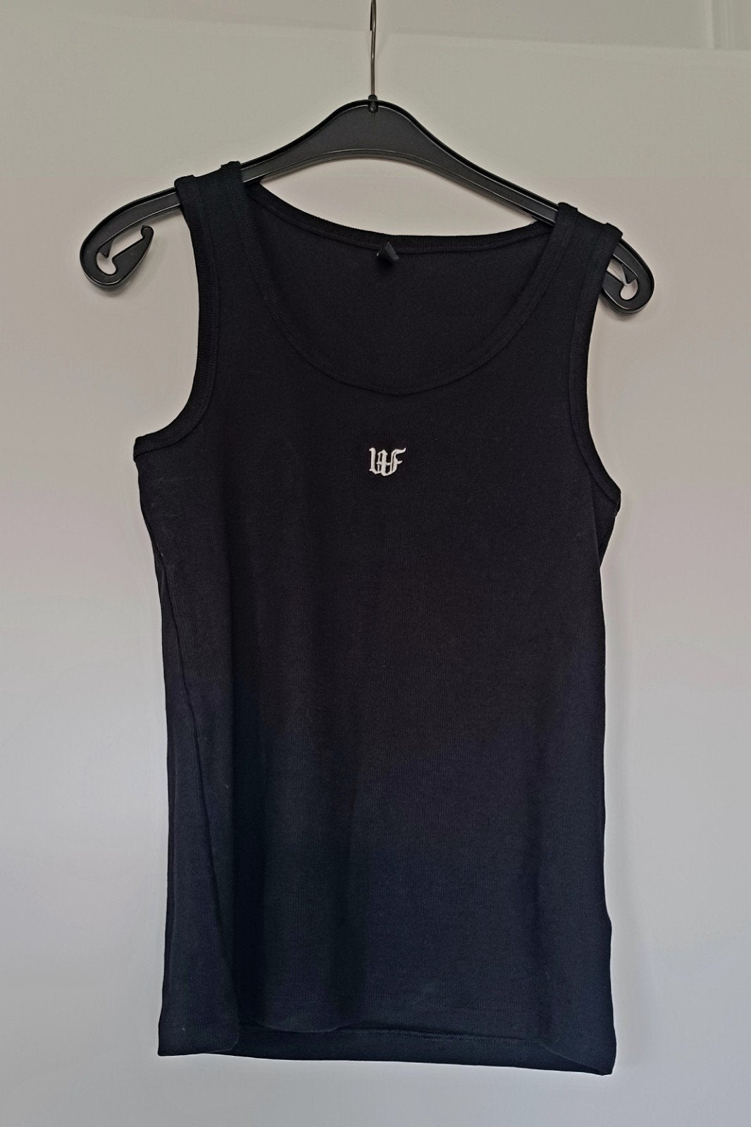 Zwarte ribbeltop maat 40 - Nooit gedragen, Kleding | Dames, Maat 38/40 (M), Zwart, Nieuw, Ophalen of Verzenden