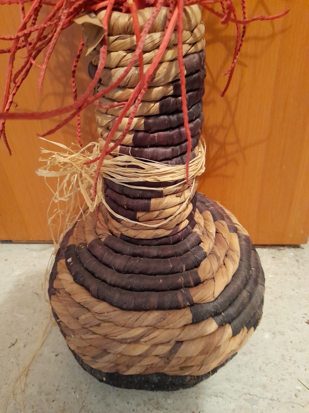 rotan vaas met takken, Ophalen