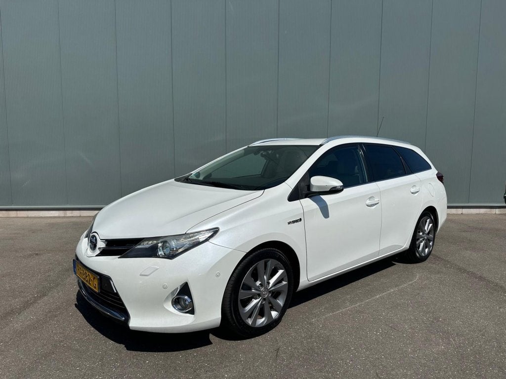 Toyota Auris Touring Sports 1.8 Hybr. Lease LEDER | CAMERA |, Auto's, Toyota, Automaat, Euro 5, 4 cilinders, Wit