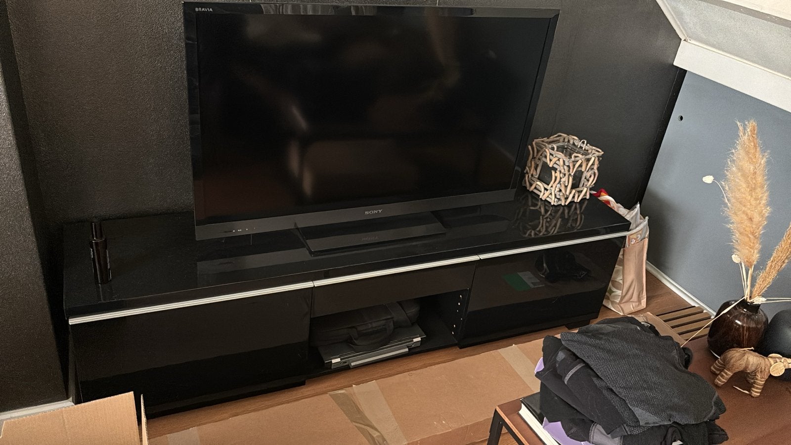 Zwart TV-meubel met opbergruimte, Ophalen, Kunststof, Gebruikt, 150 tot 200 cm