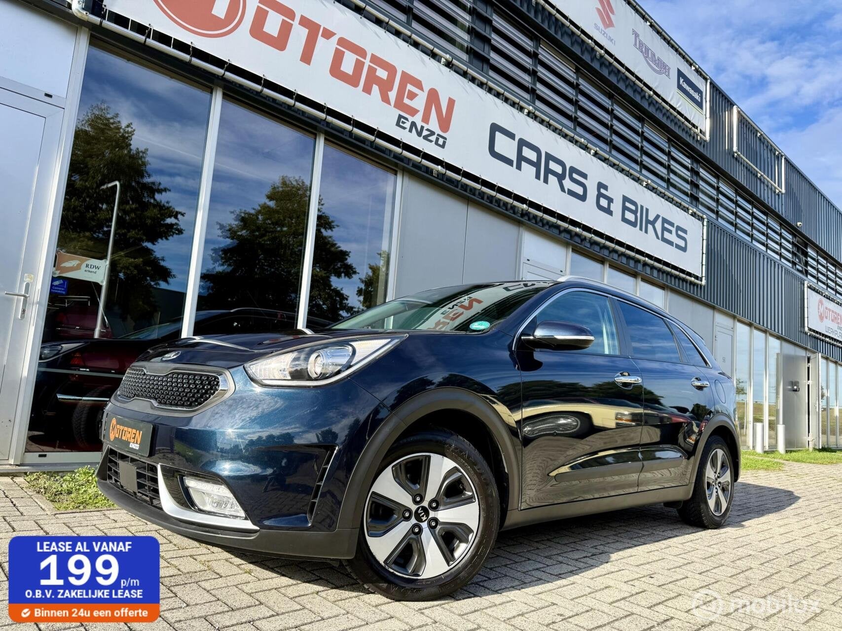 Kia Niro 1.6 GDi Hybrid executive line Full options NL, Gebruikt, Blauw, 26 km/l, Hybride Elektrisch/Benzine