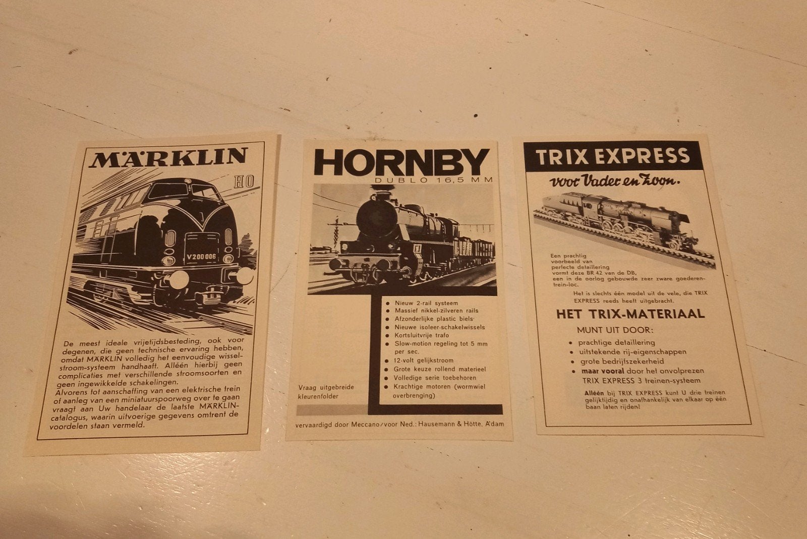 3 vintage modeltrein reclames, märklin trix en hornby, Ophalen, Gebruikt, Trein