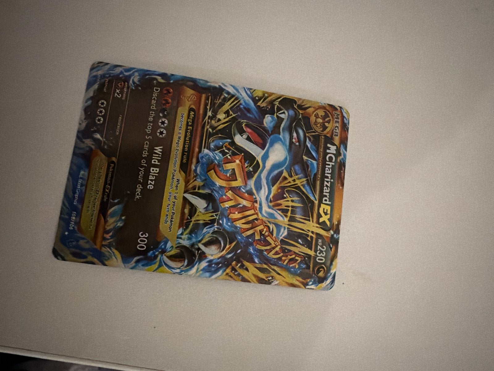 Pokémon M Charizard EX kaart - Zeldzaam en krachtig, Ophalen of Verzenden, Gebruikt, Losse kaart