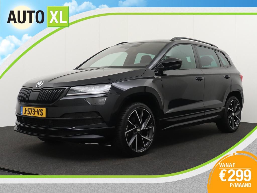 Skoda Karoq 1.5 TSI 150 PK Aut. Sportline Trekhaak Adapt.Cru, Auto's, Skoda, 4 cilinders, 150 pk, Zwart, Bedrijf