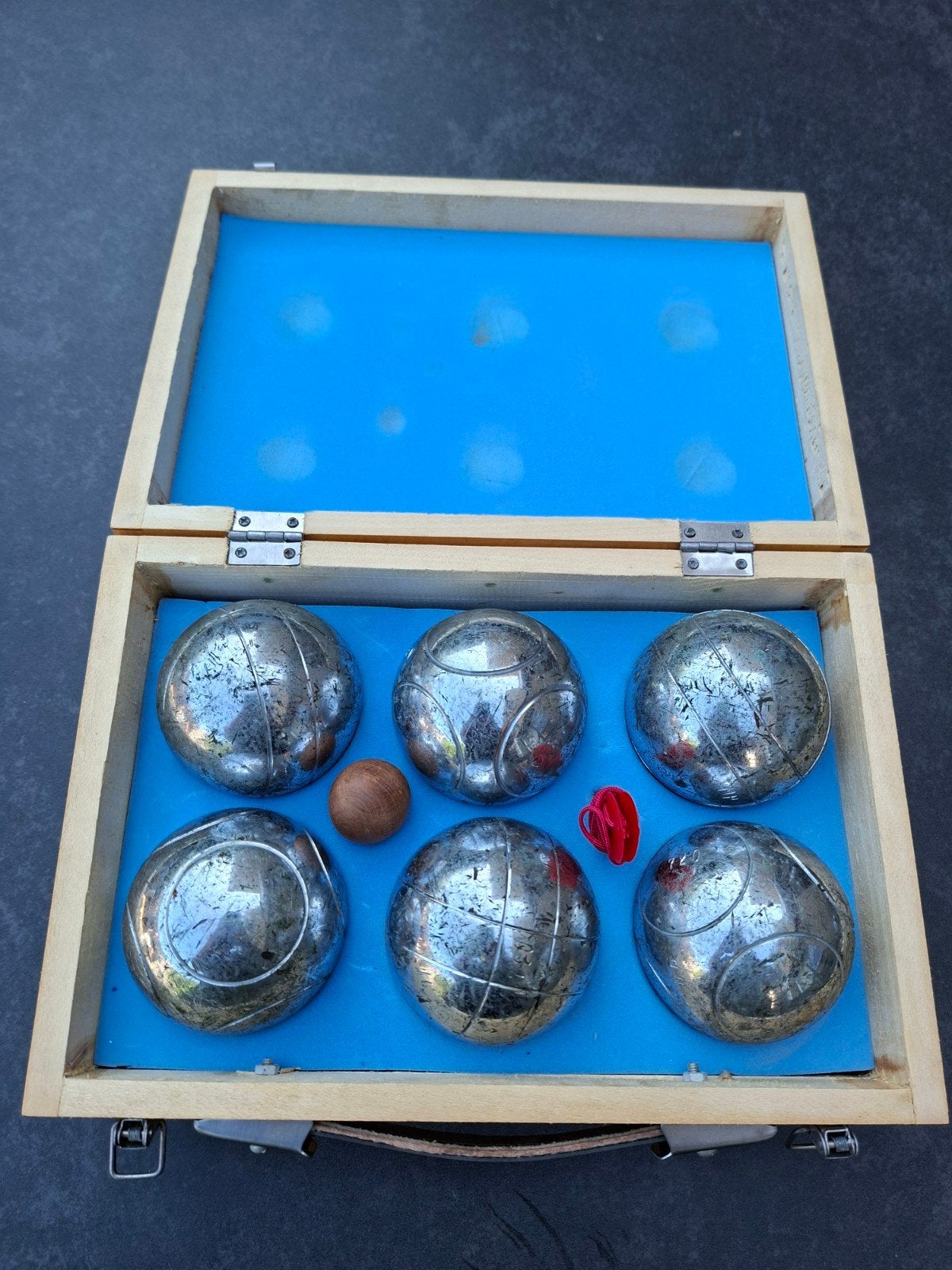 jeu de boules, Ophalen