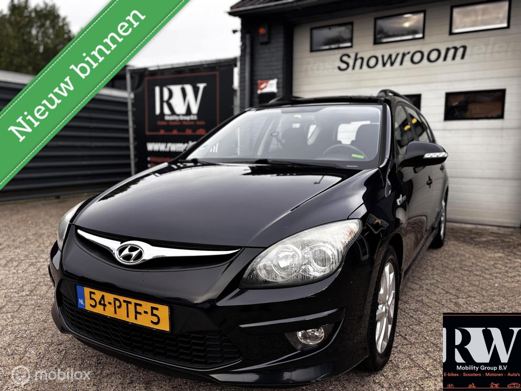 Hyundai i30 CW 1.6i i-Motion *NAP*AIRCO*TREKHAAK*PDC*, Auto's, Voorwielaandrijving, Gebruikt, 1591 cc, 4 cilinders