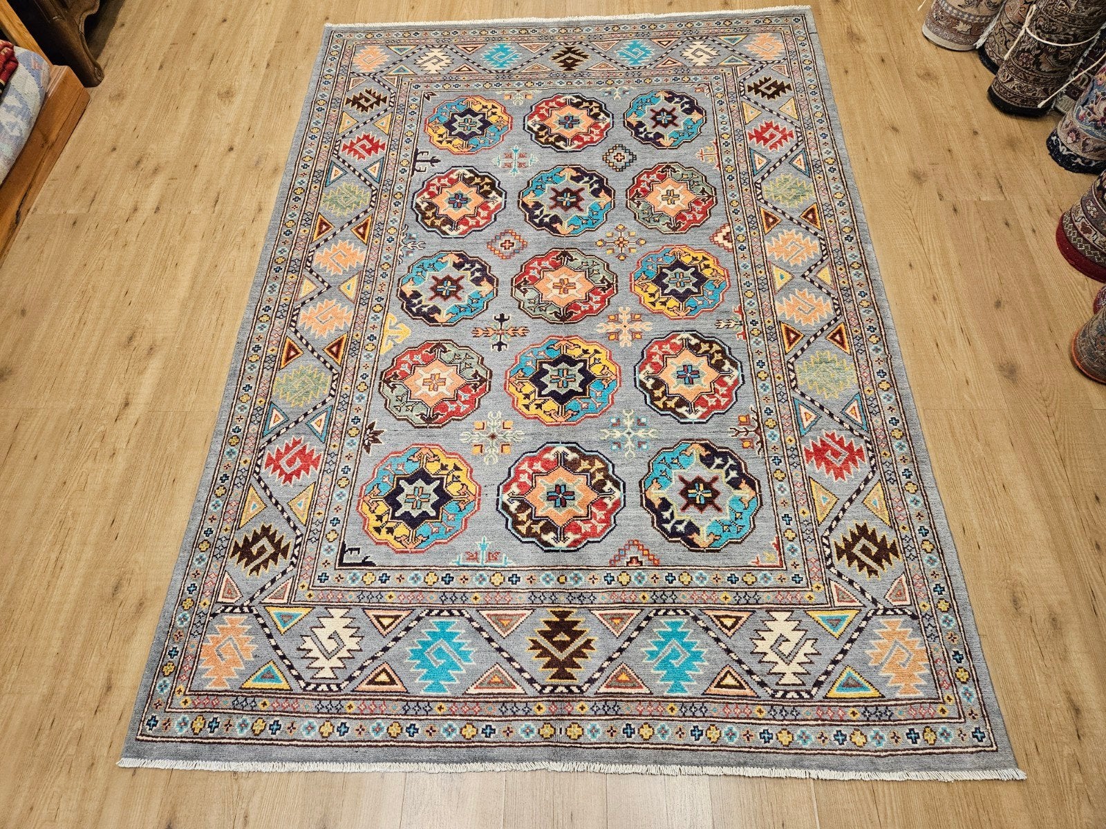 Handgeknoopt oosters tapijt kazak 241x174