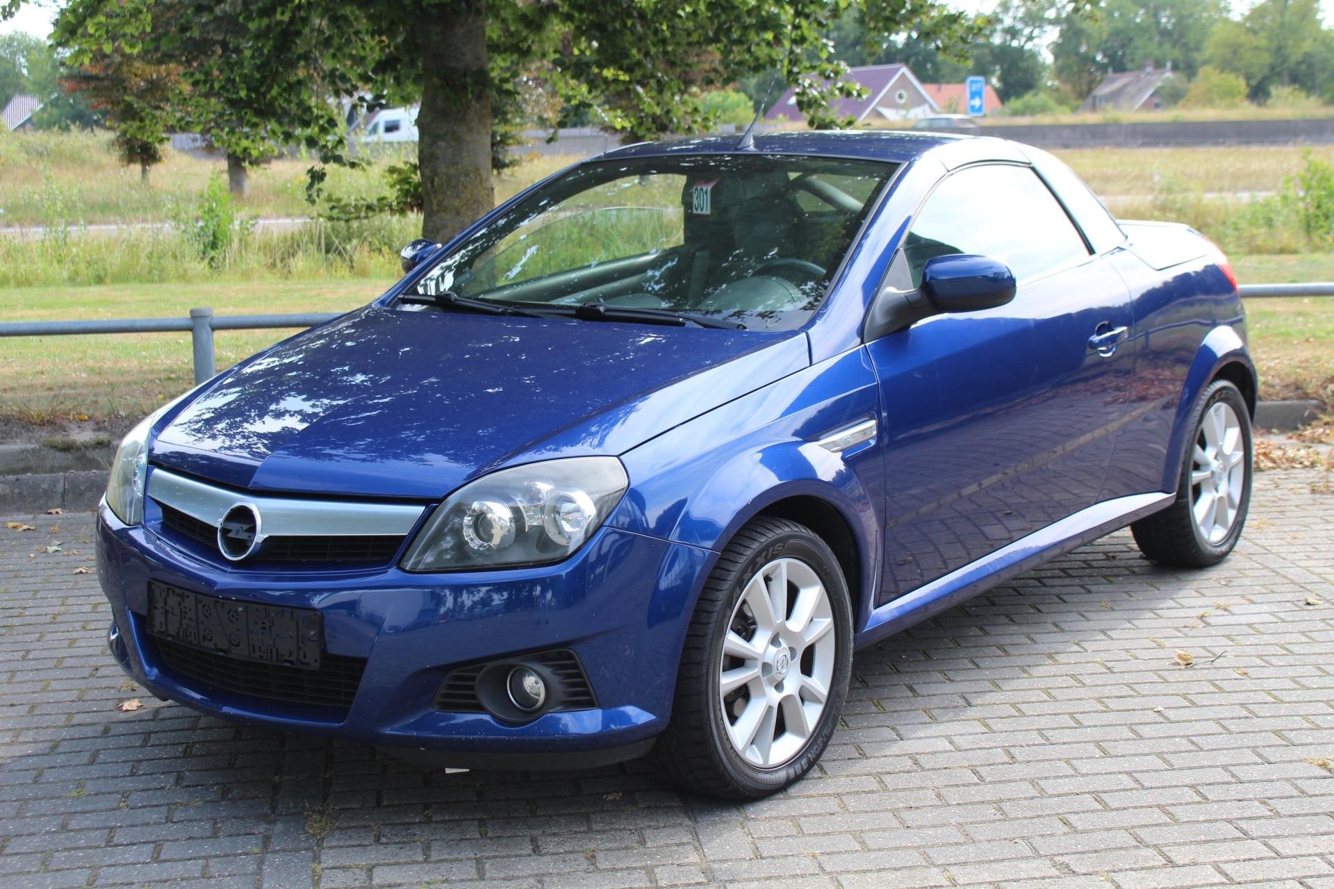 Opel Tigra 1.8 Roadster PRACHTIGE AUTO!, Auto's, Opel, 4 cilinders, Cabriolet, Blauw, Bedrijf