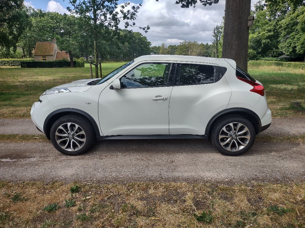 Nissan Juke 1.6 Business Edition Nieuwe banden en APK, Auto's, Voorwielaandrijving, Zwart, 4 cilinders, Alcantara