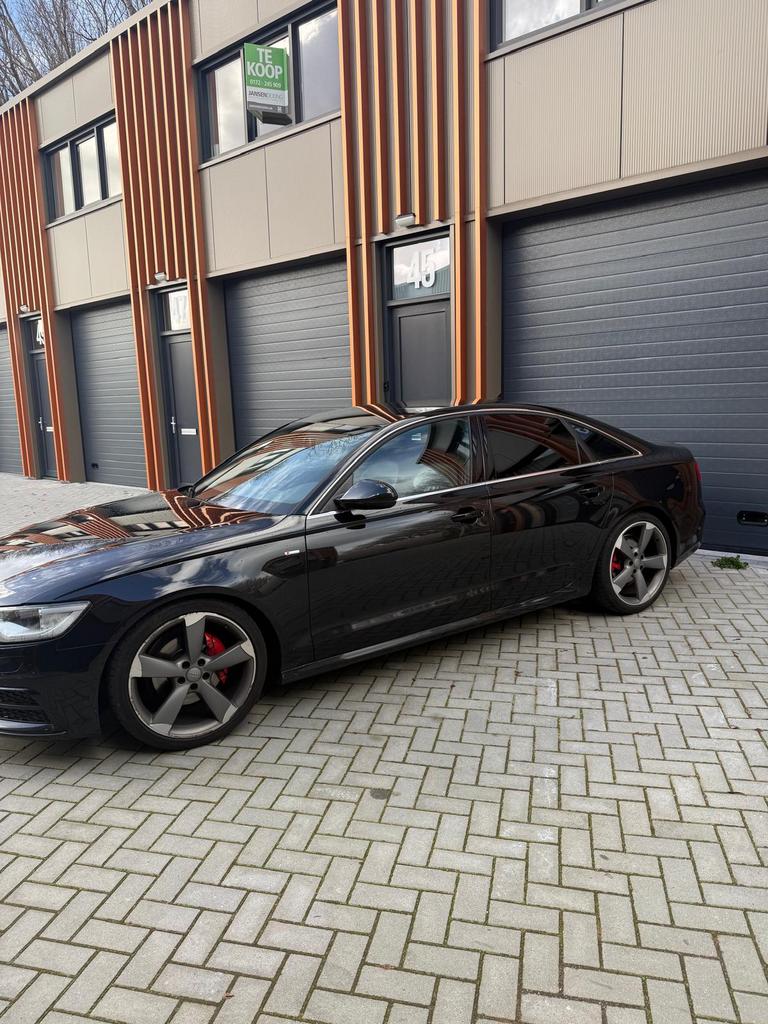 Audi A6 2.0 Tfsi 132KW Multitronic 2014 Zwart, Auto's, Audi, Zwart, 4 cilinders, 1984 cc, 179 pk