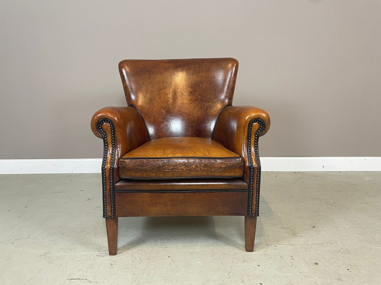 Schapenleren clubfauteuil “Rosan” van Lounge Atelier vintage, Huis en Inrichting, Fauteuils, Ophalen, Gebruikt, Leer