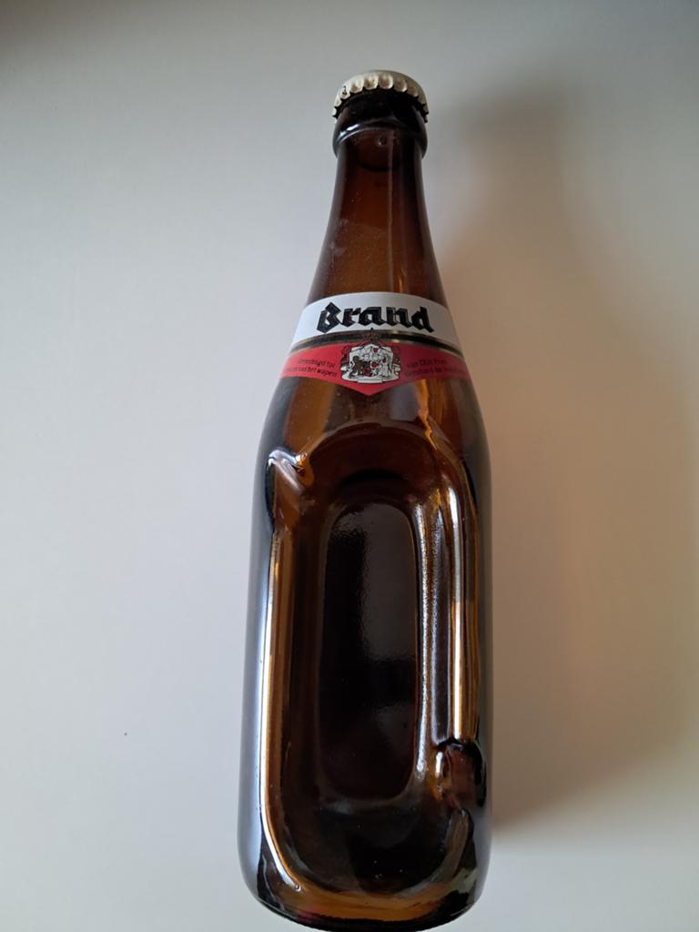Lege Brand bierfles met kroonkurk, Ophalen of Verzenden, Gebruikt
