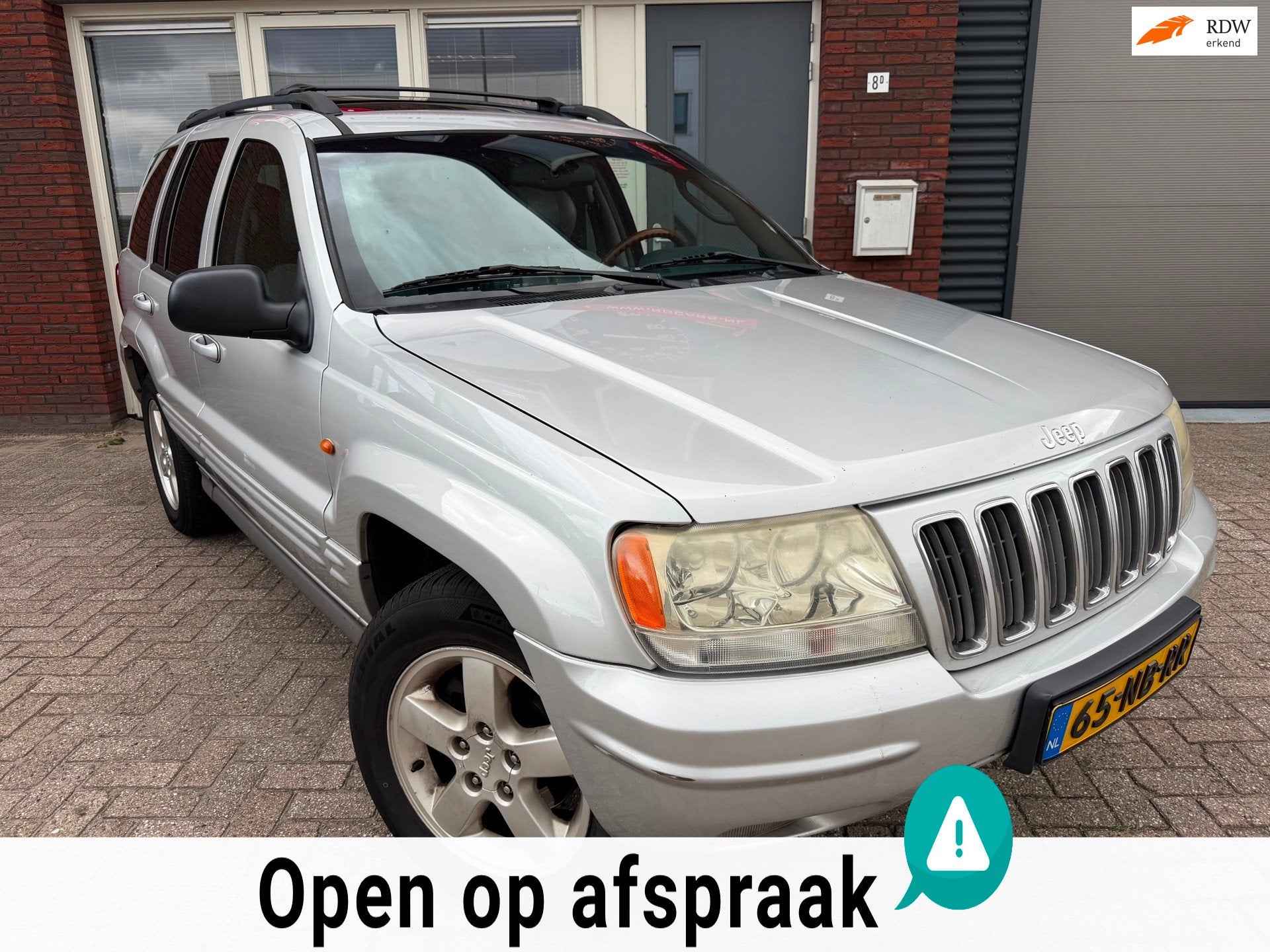 Jeep Grand Cherokee 4.7i V8 Overland High Output / Pano / Le, Automaat, Gebruikt, Met garantie (alle), 1969 kg
