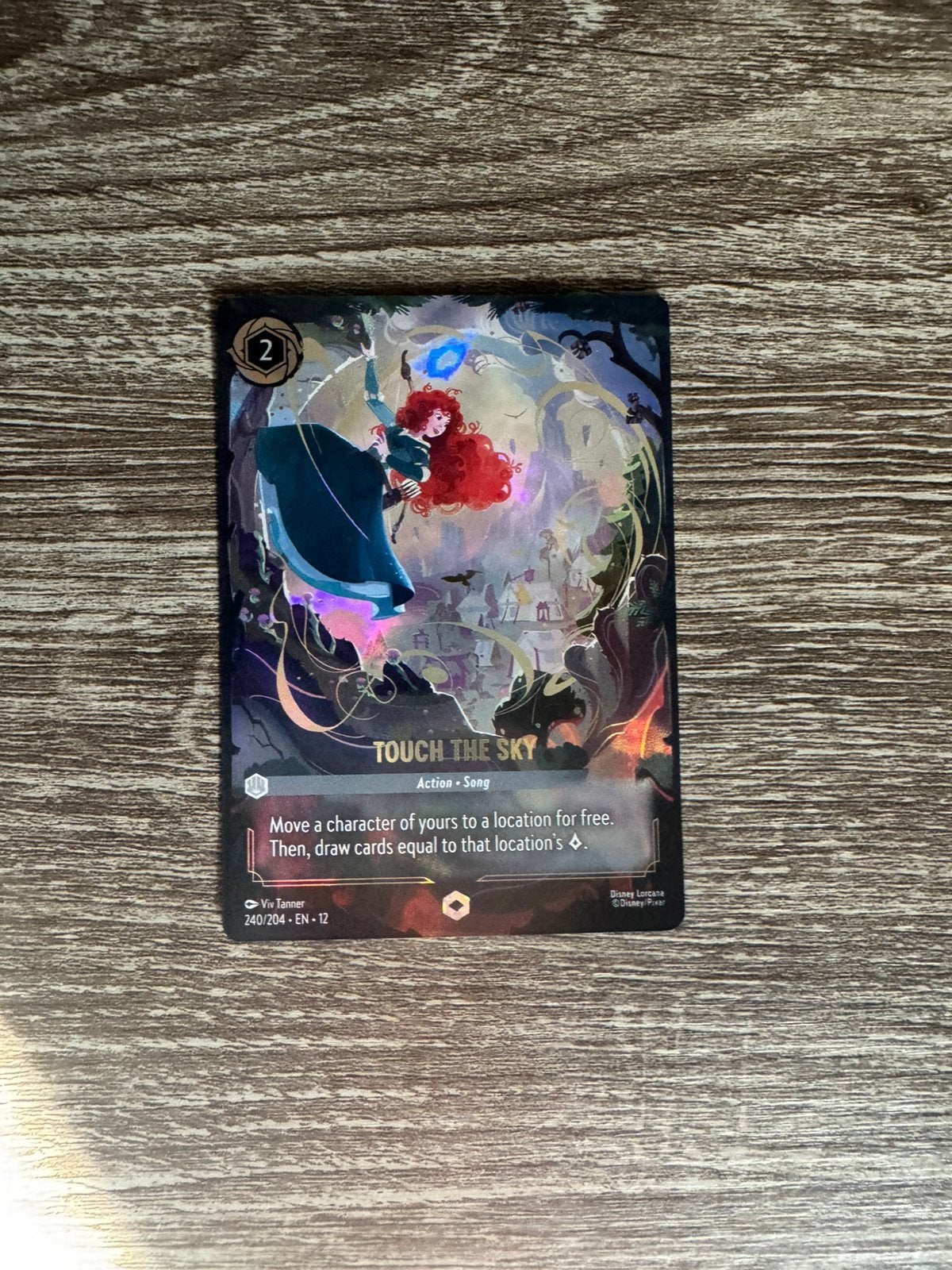 Lorcana enchanted “Touch The Sky” 240/204 van Wilds Unknown, Hobby en Vrije tijd, Ophalen of Verzenden, Nieuw, Losse kaart, Foil