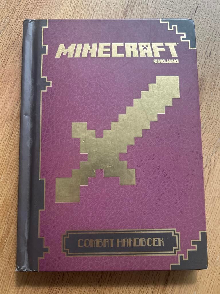 Minecraft Combat Handboek - Leer Vechten en Overleven, Ophalen of Verzenden, Zo goed als nieuw