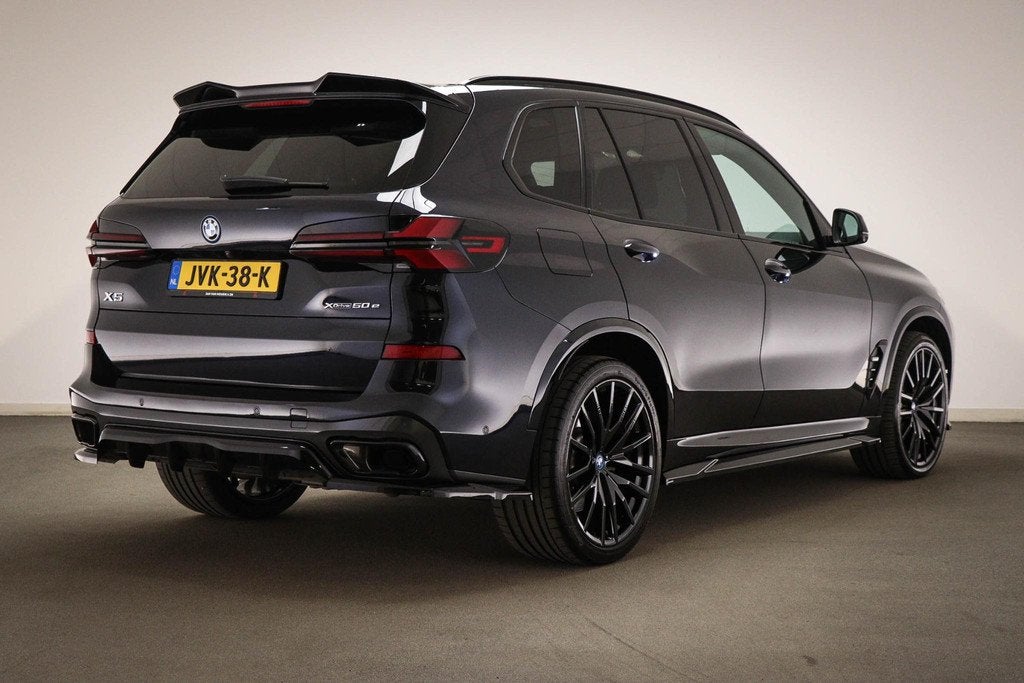 BMW X5 xDrive50e | PANORAMADAK | ACHTERBANKVERWARMING | INDI, Gebruikt, 2395 kg, Met garantie (alle), Zwart
