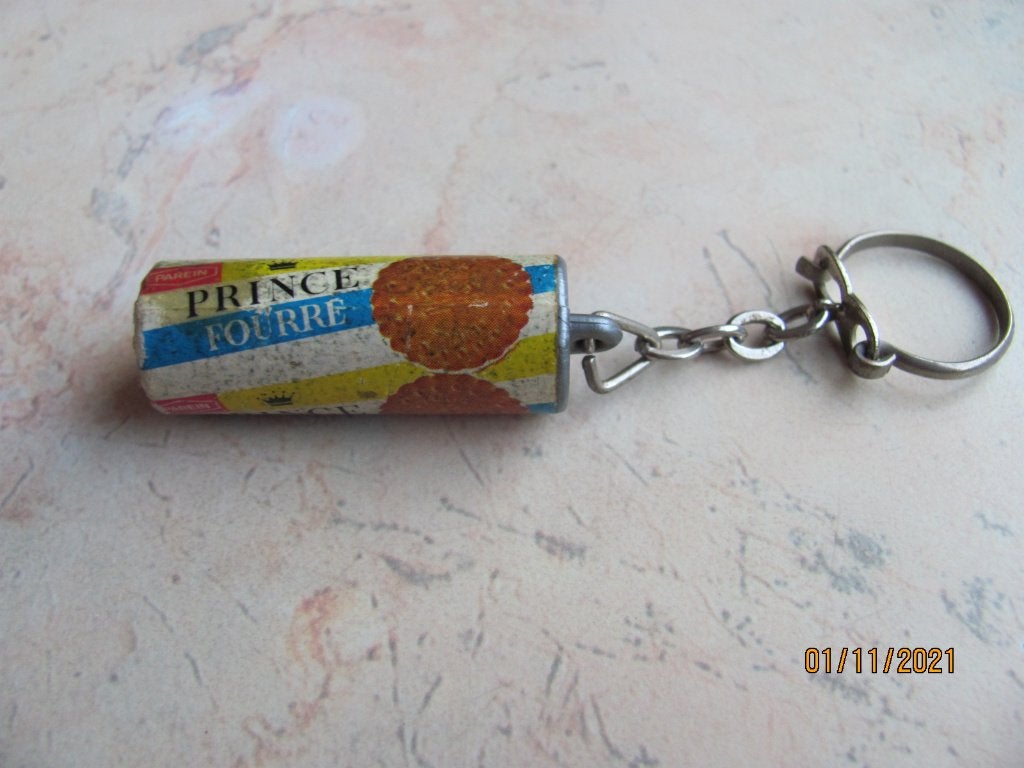 VINTAGE reclame PRINCE Fourré Parein SLEUTELHANGER jr 60 70, Ophalen of Verzenden, Gebruikt, Gebruiksvoorwerp